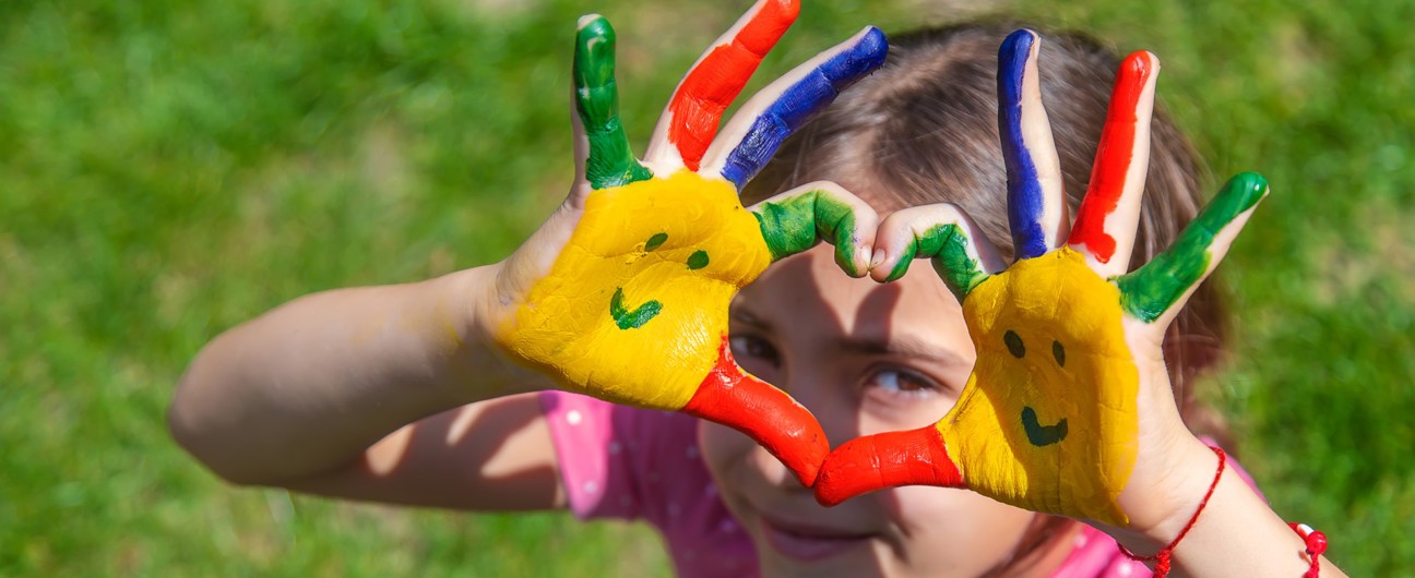 Hands Of A Child With A Painted Smile Selective F 2024 12 19 15 47 10 Utc